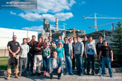 A group of tourists Chernobyl zone near the Chernobyl NPP on an excursion